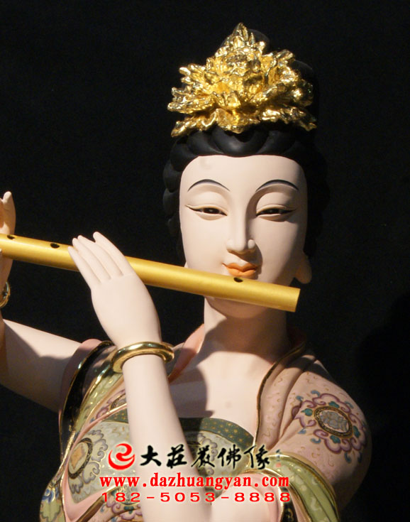 生漆脱胎笛子伎乐天彩绘神像特写 生漆脱胎笛子伎乐天彩绘神像特写