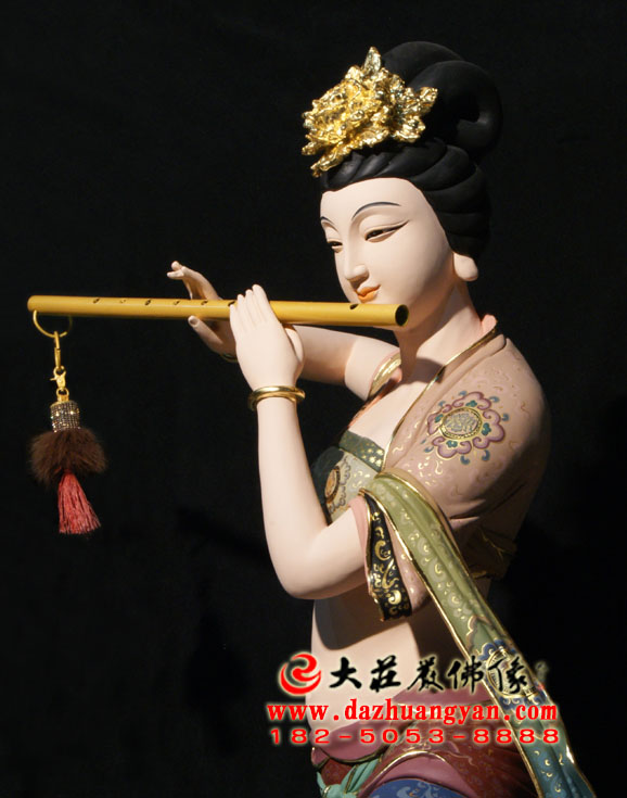 生漆脱胎笛子伎乐天彩绘神像侧面近照 生漆脱胎笛子伎乐天彩绘神像侧面近照